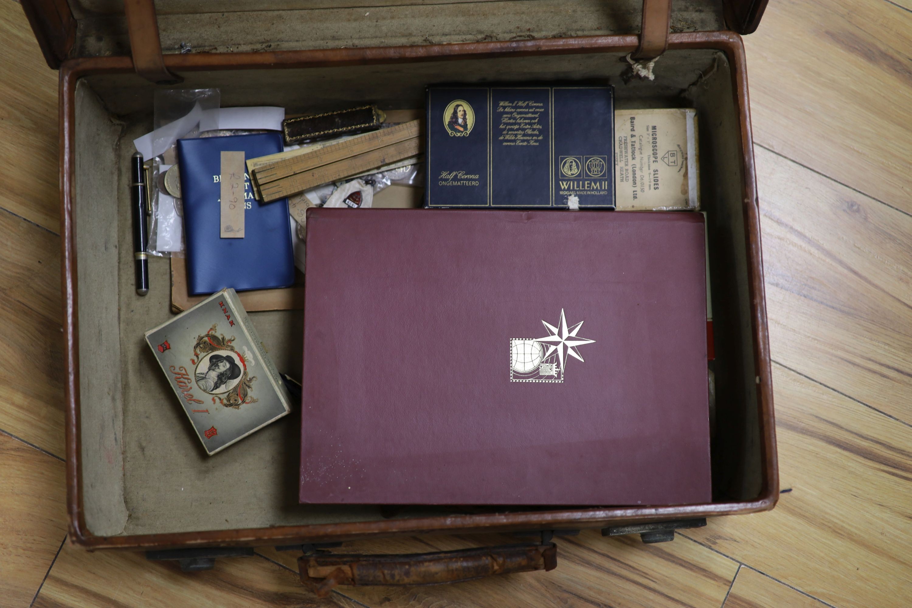 Cigar ephemera and mixed collectables in a leather suitcase